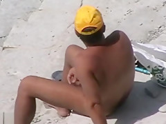 Yellow cap guy wankin seaside...