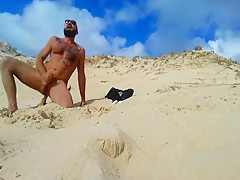 Bearded Stud Fucks Himself On Beach...